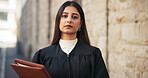 Face, file and judge or woman in city for courtroom schedule, legal statement and justice constitution. Trial report, verdict claims and evidence legislation with female magistrate for law practice