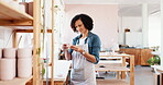 Woman, workshop and inspection with pottery, inventory and product manufacturing planning. Ceramic manager thinking with clay pot, stock and designer in small business, studio and retail production