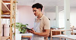 Workshop, planning notes and man with pottery checklist, inventory and retail production. Person, employee and ceramic manager in studio, documents and designer in small business and manufacturing