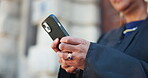 Online, lawyer and woman with smartphone, outdoor and research for case on website, low angle and typing. Browsing, advocate and mature person with mobile for lawsuit, digital and legal info in city