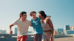 City, people and friends with hug for fitness, marathon challenge and conversation with laughing. Bridge, men and woman with communication for exercise, support and walking together after training