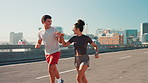 Running, fist bump and fitness with couple in city for marathon training, health and race partner. Achievement, competition and exercise with people for support, workout and wellness together