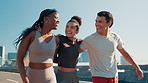 Running, hug and happy with people in city for training support, bonding and workout team. Diversity, fitness and health with group of friends outdoor for marathon, challenge and exercise together