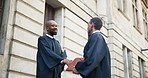 Judge, men and handshake in city for deal, contract agreement or thumbs up for judicial partnership. Law, shaking hands and collaboration for legal settlement, dispute resolution or walk with goodbye