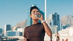 City, woman and fitness with drinking water for wellness, nutrition and break for marathon challenge. Outdoor, female person and runner with thirst for h2o liquid, hydration and detox after workout