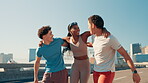 City, group and friends with hug for fitness, marathon challenge and conversation with laughing. Bridge, men and woman with communication for exercise, support and walking together after training