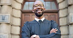 Face, smile and black man for judge in city for career confidence, urban justice and court recess. Portrait, male lawyer and arms crossed with trail process, legal procedure and authority for hearing