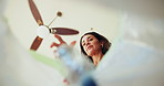 Below, woman and bottle in trash at house for recycling, cleaning service and waste management. Female person, pick up plastic and garbage for hygiene, disposal routine and environment responsibility