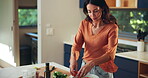 Kitchen counter, hands and salad with vegetables, vegan and healthy diet for lunch and nutritionist. Home, meal prep and person with process for cuisine, nutrition or culinary skills with ingredients