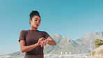 Woman, smart watch and break in city for fitness, check timer or catching breath for wellness. Runner, reset clock and outdoor with tech for cardio tracking, app notification and thinking at space