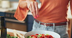 Kitchen counter, hands and salad with vegetables, sprinkle and healthy diet for lunch and nutritionist. Home, vegan and person with process for cuisine, flavor and culinary skills with ingredients
