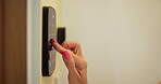 Smart home, security system and hand of woman with technology for access, safety or control panel. AI software app, house automation or closeup of person with touchscreen keypad for password code