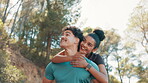 Couple, love and piggyback for fitness in nature for exercise, fun training and playful break. Smile, people and embrace with support, romance and bonding together for sightseeing for travel workout