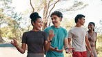 Talking, fitness and friends in park for walking, cardio workout and exercise for wellness in morning. Nature, runner group and men and women in funny conversation, relax and chat for training