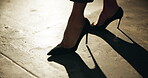 Cigarette, high heels and shadow of woman on ground for attitude or beating addiction from above. Nicotine, smoke and squash with person downtown in stilettos for end of tobacco habit on concrete