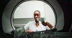 Washing machine, cash and black woman in crime for money laundering and investment scam in fraud. Laundry, cleaning and person throwing bank notes for criminal funds, corruption and illegal business