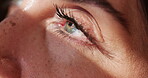 Eyes, morning and wake up with woman in home closeup for break, recovery or resting on weekend. Dreaming, opening and sleeping with person in apartment for free time, stress relief or wellness