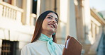 City, idea and smile with lawyer woman outdoor as legal council for court case or trial. Book, buildings and street with happy Indian attorney at law in urban town for professional representation