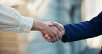 Business people, handshake or city with meeting for agreement, partnership or deal together. Closeup, employee or colleagues shaking hands with b2b for collaboration, teamwork or introduction in town