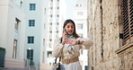 Woman, phone call and late with watch in city for deadline, time management or delay. Female person, employee or rushing with mobile smartphone or wristwatch for schedule or tasks in an urban town