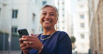 Mature, happy woman and face with phone in city for app, connection or communication. Portrait, female person or wink with smile on mobile smartphone for network, chatting or texting in an urban town