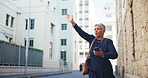 Mature woman, phone and calling taxi in city for transport, lift or ride on sidewalk. Female person, travel or commuter with mobile smartphone or hailing cab for driver app or stop in an urban town