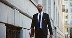 Briefcase, city and walking with black man lawyer outdoor as legal council for court case or trial. Consultant, folder and travel with attorney at law downtown for commute to appointment as advocate