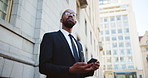 Business, thinking and black man in city, smartphone and decision with digital app, lawyer or text. African person, employee or attorney in street, choice or cellphone for email or message to contact