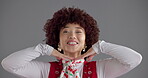 Face, peace sign and wink with woman in studio for emoji, social media or profile picture. Energy, silly and smile with happy or playful influencer on gray background for expression or hand gesture
