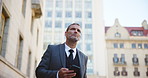 Business, thinking and man in city, smartphone and decision with digital app for location. Mature person, employee and consultant in street, choice or cellphone for social media or message to contact