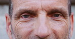 Vision, face and eye care of senior man with optical assessment, glaucoma exam and eyesight test. Closeup, optometry and elderly person with focus for medical service, prescription lens or healthcare