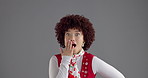Face, gasp and surprise with woman in studio for expression, good news or gossip. Emoji, reaction and wow with happy person isolated on gray background for announcement, information or promotion