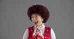 Woman, wink and smile in studio with vintage style, face and joke with secret deal by background. Girl, person and laughing in portrait with eye sign, retro fashion and playful flirting in Brazil