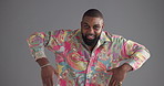 Black man, music and robot dancing in studio for energy or pop and lock on a gray background. Male person, model or dancer with smile or cool vibe for funny motion, funky moves or party celebration