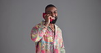 Retro telephone, fashion and black man in studio, smile and stylish clothes on gray background. Mockup space, African person or happy model with communication, calling or vintage outfit with landline