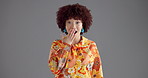 Face, shock and happy woman with surprise in studio for fashion sale on gray background with mockup space. African person, portrait and wow for amazing deal, news announcement and omg for gossip