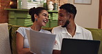 Couple, laptop and smile for document, mortgage and financial planning or budgeting together on sofa at home. Man, woman and excited with finance, paperwork and bills discussion in living room 
