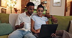 Streaming, watching and couple with laptop, date and bonding with entertainment, online and living room. House, browsing and people with tech for film, woman and man with coffee, chilling or choice