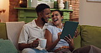 Streaming, laughing and couple with tablet, home and bonding with entertainment, watching or lounge. Apartment, man and woman with tech for film, coffee and browsing on web for date, online and house