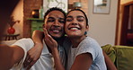 Happy couple, faces and hug with selfie on sofa for love, photography or picture together at home. Portrait, man and woman with smile or embrace for capture moment, post or social media at house