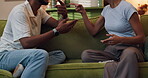 Couple, hands and dispute with Anxiety, stress and drama at home or apartment living room. Upset, woman and man with argument, angry and fight with toxic marriage and mistake or crisis with partner