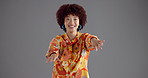 Face, dancing and happy woman in studio, smile or confident personality on gray background. Portrait, person or dancer with fashion, model or trendy clothes with stylish outfit, aesthetic or movement