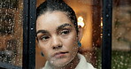Thinking, woman and sad with window at house for reflection, loneliness and worry of storm phobia. Rain, female person and thoughts for winter weather, remember past and anxiety for trauma experience