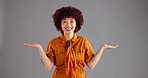 Happy woman, face or hands out with option in studio for choice, pick or selection on a gray background. Portrait, female person or model with smile, palms or decision for advertising on mockup space