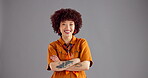 Studio, woman and face with arms crossed for fashion, vintage style and happiness with confidence. Mockup space, African person and portrait with pride for retro clothes, trendy and gray background