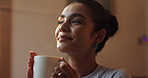 Happy, smile and woman with coffee in home for caffeine break, resting and warm beverage. Morning, house and person relax with latte, tea or espresso for calm, peace and satisfaction in living room