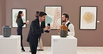 Art, phone and people with photography in gallery for ceramic vase, artwork exhibition or explain catalog. Creative expo, man or curator with discussion of museum sculpture, auction event or showcase