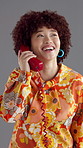 Girl, chat and vintage telephone in studio with smile for story, gossip and disco style by background. African woman, phone call and happy for discussion, contact and laugh at joke in retro fashion