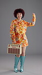 Dancer, groovy and radio with face of woman in studio for retro style, funky vibe and bohemian culture. Fashion, indie aesthetic and disco music with person on gray background for sound and energy