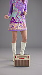 Dance, radio and vintage with body of woman in studio for retro style, funky vibe and bohemian fashion. Groovy streaming, indie aesthetic and disco music with person on gray background for sound